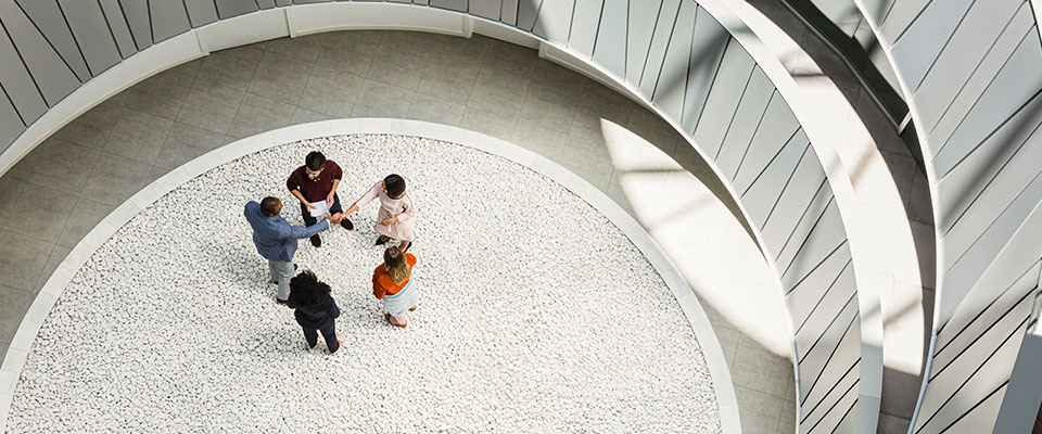 group of people shaking hands